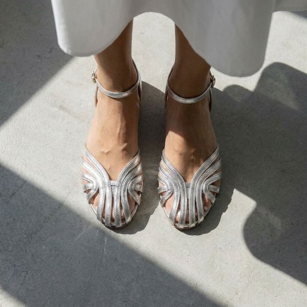 Elegant cage sandal silhouette with contemporary styling